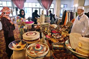Visitors taking keen interest in different handmade items displayed by artisans during two day "Daachi Arts & Craft Exhibition" at Pak China Friendship Centre in the Federal Capital