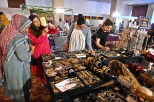 Visitors taking keen interest in different handmade items displayed by artisans during two day "Daachi Arts & Craft Exhibition" at Pak China Friendship Centre in the Federal Capital