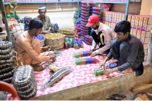 A person pulling handcart loaded with bangles supply to Bangles Market.