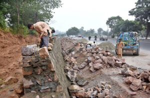 Heavy machinery being used to construction of Park Road during development work in the Federal Capital