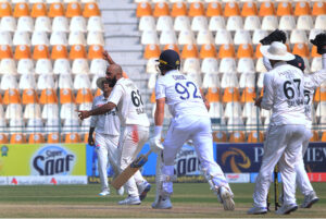 Abdullah Shafique dives in a valiant attempt to catch England's Shoaib Bashir during day four of the Second Test Match at Multan Cricket Stadium.