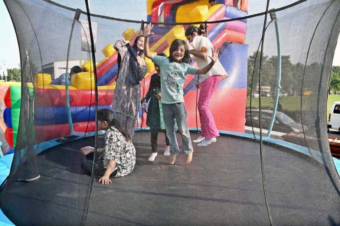 Children enjoying on trampoline during the closing ceremony of 3-day 