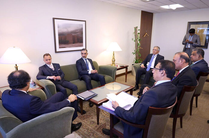 Federal Minister for Finance and Revenue Senator Muhammad Aurangzeb in a meeting with Dubai Islamic Bank's Group CEO Dr. Adnan Chilwan