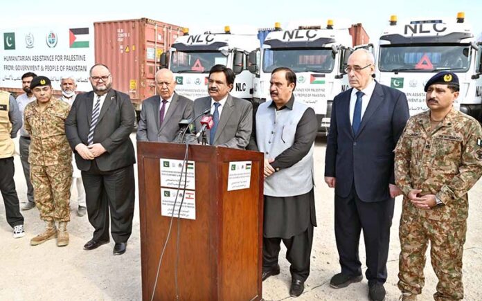MNA, Engineer Qamar-ul-Islam Raja addressing during ceremony, On instructions of Prime Minister, Pak NDMA Dispatched 15th & 16th Consignment of 200 tons of relief items for people of Lebanon & Gaza through NLC convoy from NDMA's Warehouse