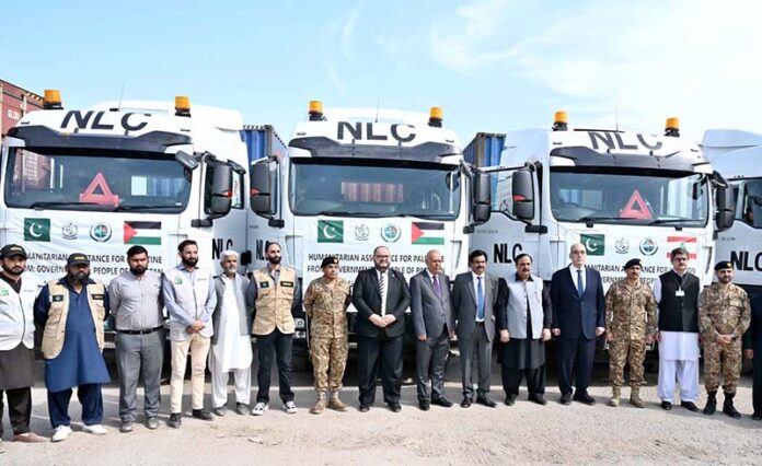 A group photograph of MNA, Engineer Qamar-ul-Islam Raja, MNA, Malik Ibrar Ahmed, Ambassador of Lebanon H.E. Ghassan El Khatib and Deputy Head of Mission of the State of Palestine H.E. Nader K. Alturk, on instructions of Prime Minister, Pak NDMA dispatched 15th & 16th Consignment of 200 tons of relief items for people of Lebanon & Gaza through NLC convoy from NDMA's Warehouse
