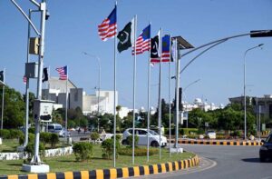 The flags of Pakistan and Malaysia hoisted in front of Parliament House, celebrating the warm reception for Malaysian Prime Minister Datuk Seri Anwar Ibrahim during his first official visit to Pakistan in early October.