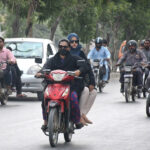 A lady drives motorcycle, is now a common practice in the city as women got more empower