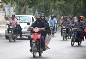 A lady drives motorcycle, is now a common practice in the city as women got more empower