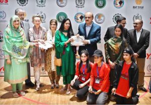 Federal Secretary, MoFE&PT, Mohyuddin Ahmad Wani giving away certificates among winners during the closing ceremony of 3-day "Girls Sports Carnival 2024" organized by Ministry of Federal Education and Professional Training at Pakistan Sports Board