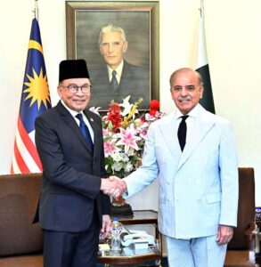 Prime Minister Muhammad Shehbaz Sharif shakes hand with Prime Minister of Malaysia YAB Dato' Seri Anwar Ibrahim.