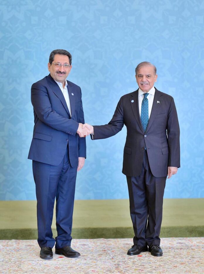 Prime Minister Muhammad Shehbaz Sharif receiving Iran's Minister of Industry, Mines and Trade H.E. Mohammed Atabak at the venue of the 23rd SCO Council of Heads of Government