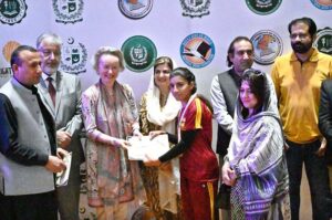 Federal Secretary, MoFE&PT, Mohyuddin Ahmad Wani giving away certificates among winners during the closing ceremony of 3-day "Girls Sports Carnival 2024" organized by Ministry of Federal Education and Professional Training at Pakistan Sports Board