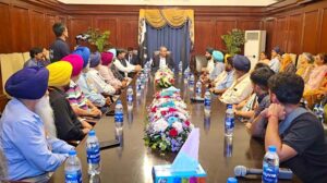 Interior Minister Mohsin Naqvi greeting Sikh Yaatris delegation from USA at State Guest House