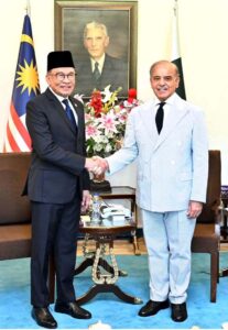 Prime Minister Muhammad Shehbaz Sharif shakes hand with Prime Minister of Malaysia YAB Dato' Seri Anwar Ibrahim.