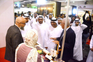 Foreigners visiting a stall at first Pakistan International Date Palm Festival at Expo Centre