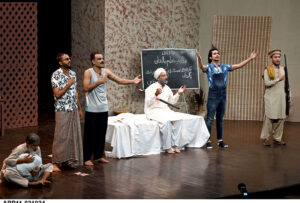 Artists performing Classical Theater Play "Taleem-e-Balghan” on the stage during the World Culture Festival 2024 at Arts Council of Pakistan Karachi late last night.