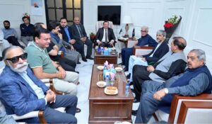 Defence Minister Khawaja Muhammad Asif addressing the business community while congratulating the newly elected officials of the Chamber of Commerce, including President Ikram ul Haq