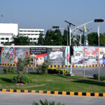 Posters and banners are displayed on the eve of Kashmir Black Day in front of Parliament House in solidarity with the people of Jammu and Kashmir