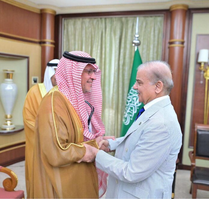Prime Minister Muhammad Shehbaz Sharif greeting Advisor at the Saudi Royal Court Mohammad bin Mazyad Al-Tuwaijri