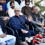 Defence Minister Khawaja Muhammad Asif talking to media persons at his residence