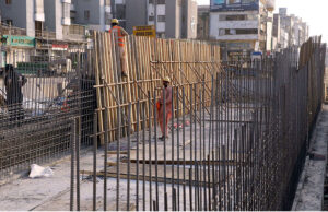 Workers engaged in the development work of Bus Rapid Transit, as Red Line project underway at University Road in the Provincial Capital.
