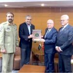 Federal Minister for Interior Mohsin Naqvi presenting souvenir to Turkiye Minister of National Defense Yasar GÜLER