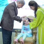 Prime Minister Muhammad Shehbaz Sharif administers polio vaccine to children on the World Polio Day
