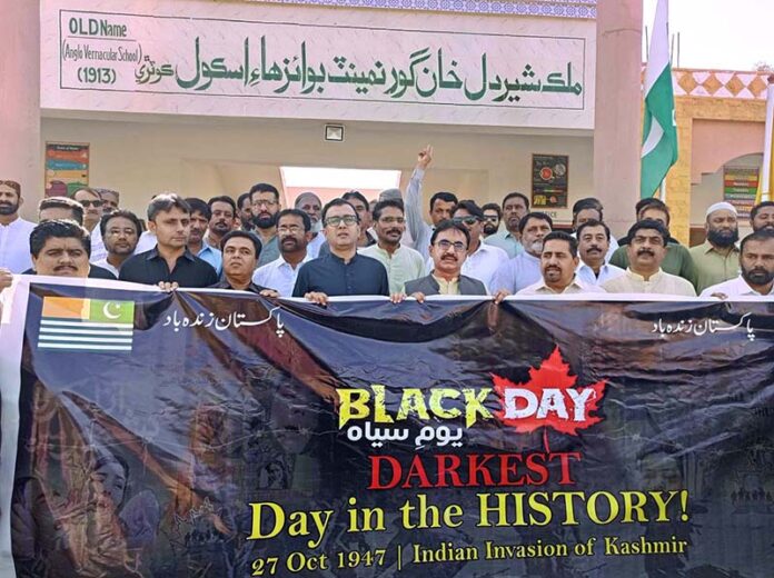 District administration official’s participants in a rally to show solidarity with Kashmiri people eve of Kashmir Black Day in solidarity with the people of Jammu and Kashmir outside Malak sherdil khan Government High School Kotri