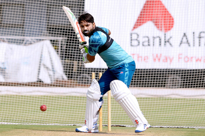Pakistan wicketkeeper Muhammad Rizwan in action during a practice session ahead of the first Test cricket match against England at the Multan Cricket Stadium