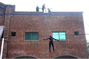 Rescue 1122 Faisalabad CERT (Community Emergency Response Team) performing rescue skills during the annual CERT Challenge competitions at Central Rescue Station GTS Chowk.