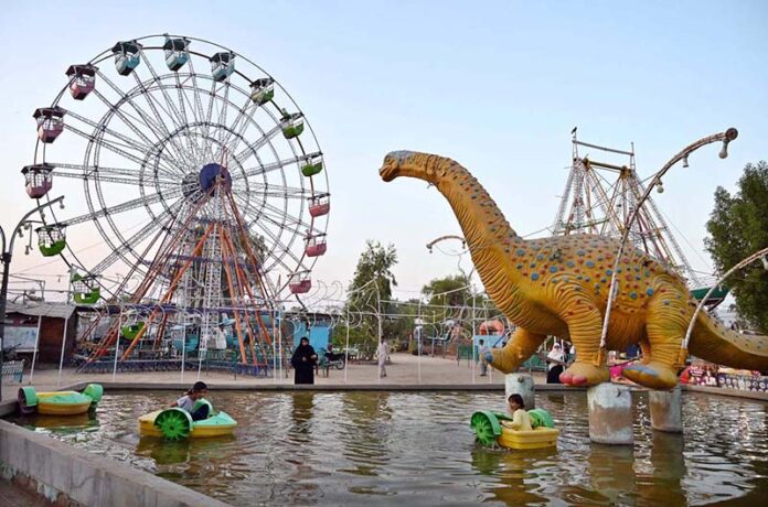 Children enjoy boat riding at Finland Rani bagh