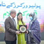 Prime Minister Muhammad Shehbaz Sharif presenting souvenirs to front line Polio Workers and the relatives of those Polio Workers who embraced martyrdom in the line of duty