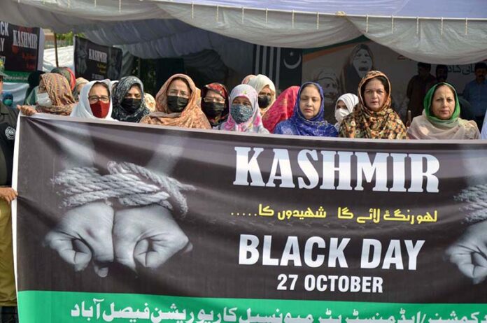 People participating in a rally regarding Kashmir Solidarity in connection with Kashmir Black Day at Zilla Council Chowk