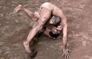 Traditional wrestlers (Pehalwans) are busy in practicing during a training session at an Akhara (wrestling pit).'Kushti', the traditional wrestling is one of the most popular games in Pakistan. Thousands of years ago when there was no cricket, no hockey, no football, the most enjoyable hobby of the people was wrestling. Even today after the introduction of so many kinds of sporting activities around the world, the sport of wrestling draws more crowds than any other sport because, fighting is a part of human nature. There are different styles of wrestling in the world today but the most famous among them is the Freestyle Wrestling