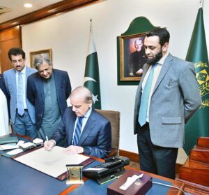 Prime Minister Muhammad Shehbaz Sharif signs the advice for presidential assent on the 26th Constitutional Amendment Bill.