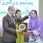 Prime Minister Muhammad Shehbaz Sharif presenting souvenirs to front line Polio Workers and the relatives of those Polio Workers who embraced martyrdom in the line of duty