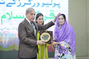 Prime Minister Muhammad Shehbaz Sharif presenting souvenirs to front line Polio Workers and the relatives of those Polio Workers who embraced martyrdom in the line of duty