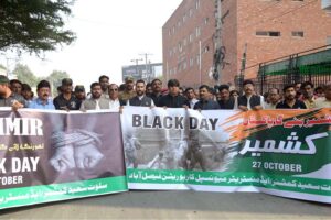 People participating in a rally regarding Kashmir Solidarity in connection with Kashmir Black Day at Zilla Council Chowk