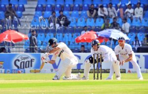 England bowler Brydon Carse celebrates with Shoaib Bashir after taking the wicket of Saud Shakeel during day one of the Second Test Match between Pakistan and England at Multan Cricket Stadium.
