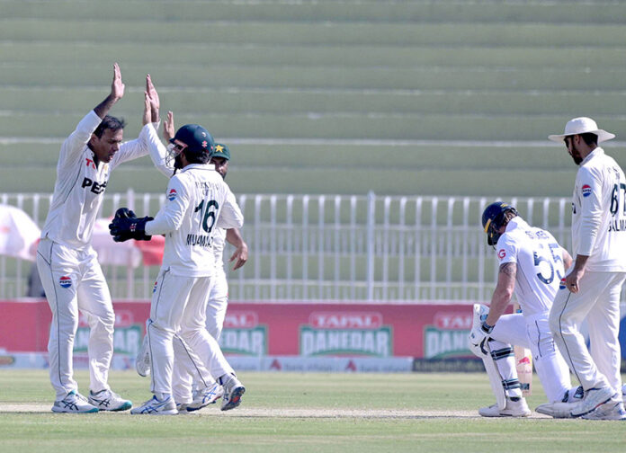Pakistan players celebrating the wicket of England batter Ben stokes during the 3rd day of the last cricket Test match between Pakistan and England Pindi Cricket Stadium