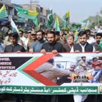 Deputy Commissioner Waseem Hamid Sindhu leading a rally on Kashmir Black Day