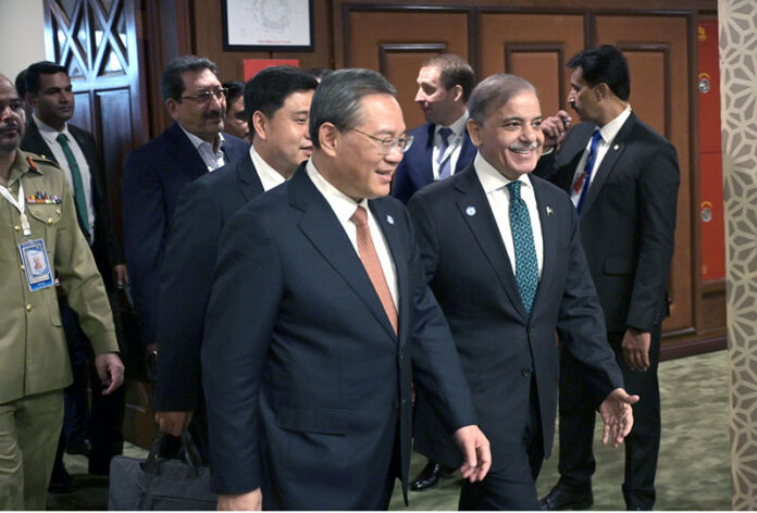 Prime Minister Muhammad Shehbaz Sharif receiving the Chinese Premier H.E. Li Qiang at the venue of the 23rd SCO Council of Heads of Government Meeting