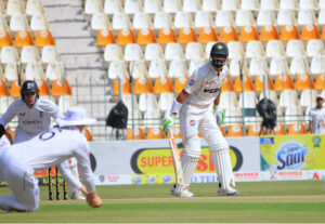 England bowler Brydon Carse celebrates with Shoaib Bashir after taking the wicket of Saud Shakeel during day one of the Second Test Match between Pakistan and England at Multan Cricket Stadium.