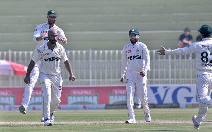 Pakistan players celebrating the wicket of England batter Jamie Smith during the 3rd day of the last cricket Test match between Pakistan and England Pindi Cricket Stadium