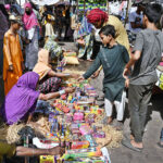 Vendors displaying the fireworks stuff to attract the customers in connection with upcoming Hindu festival Dewali at Faqir Ka Pir Bazaar