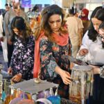 Visitors taking keen interest in different handmade items displayed by artisans during two day "Daachi Arts & Craft Exhibition" at Pak China Friendship Centre in the Federal Capital