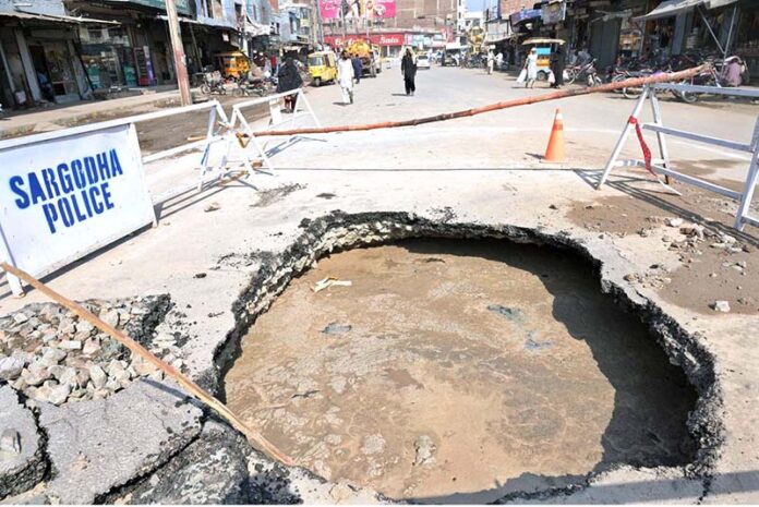A view of damage road and main sewerage line in front of the Noori Gate Church and needs the attention of concerned authorities