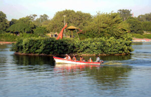 People enjoy boat ride at Gulshan iqbal Park