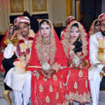 Newlyweds in mass wedding ceremony organized by social organization Door of Awareness. 15 couples got married in the ceremony
