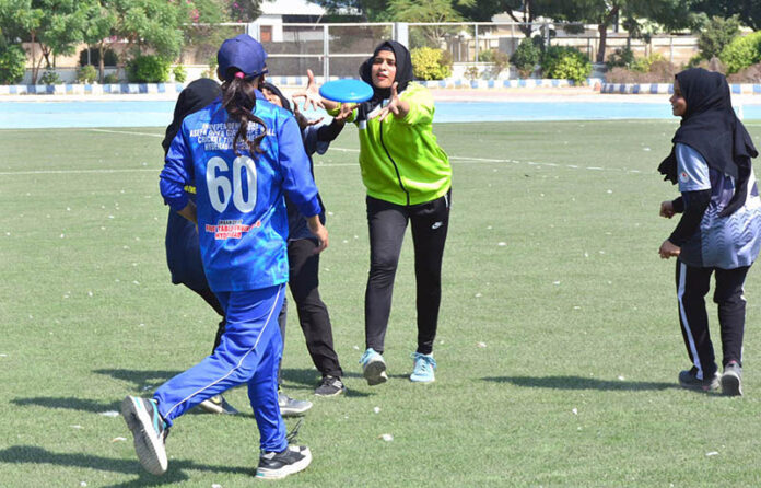 Players in action in Flying Disc match between ITS Academy & Baloch Academy teams during Hyderabad Flying Disc Championship at Public School